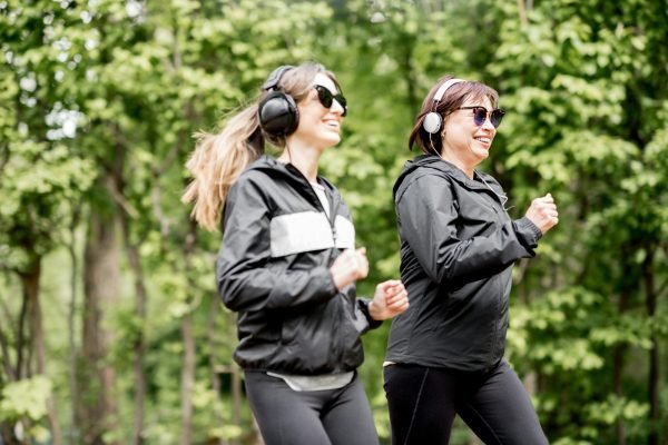 Two women running in the park Medical Weight Loss by Health and Wellness